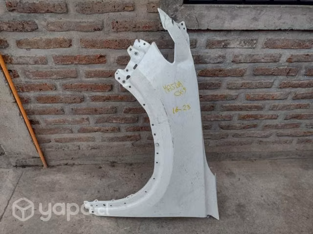 Tapabarro isquierdo mazda 16-23