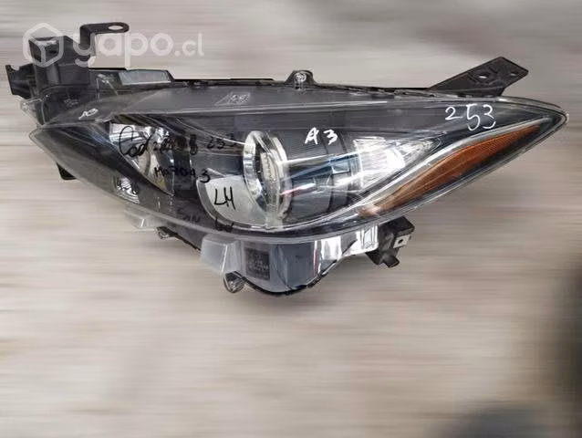 Foco óptico Lh Mazda  halogeno p2