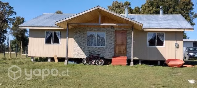 Parcela con casa