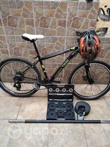 Bicicleta y mancuernas