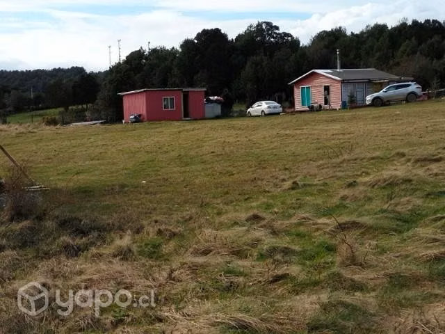 Parcela con casas
