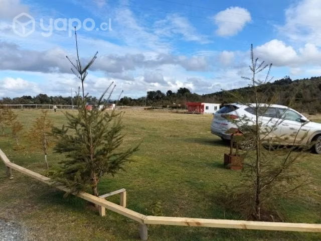 Parcela con casas