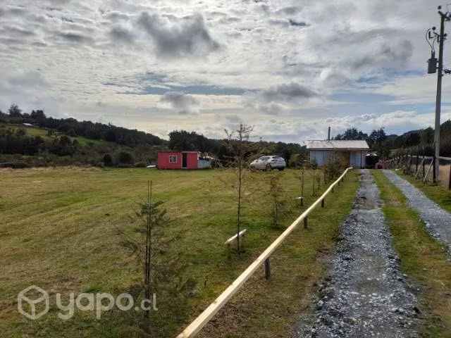 Parcela con casas