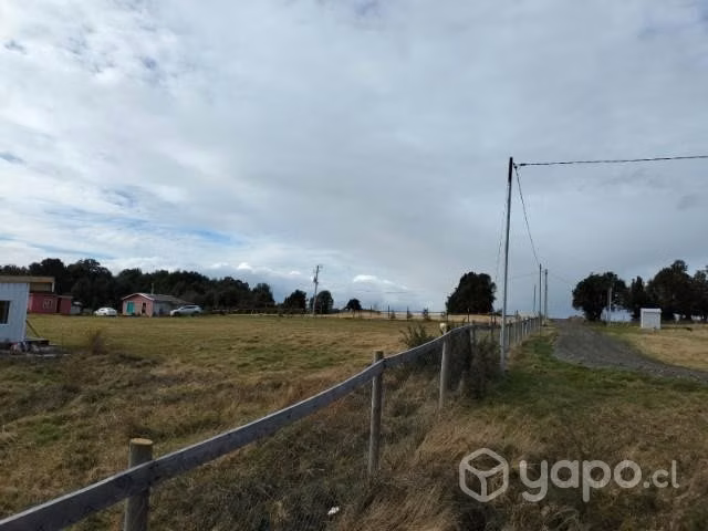 Parcela con casas