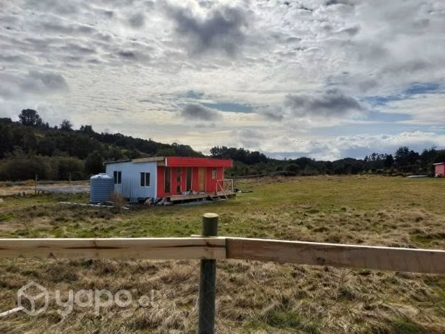 Parcela con casas