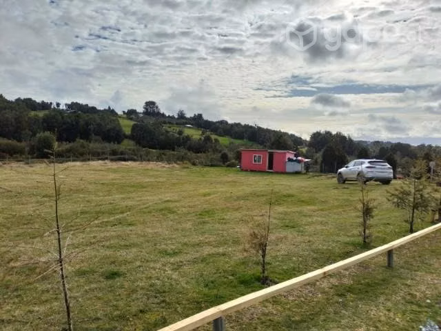 Parcela con casas