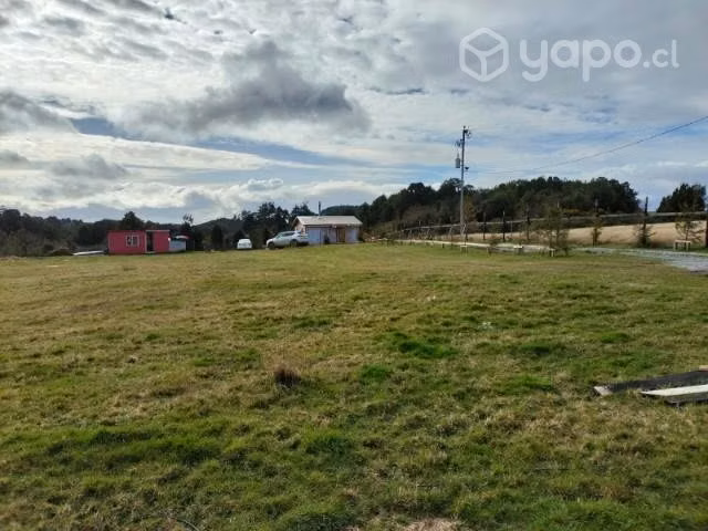 Parcela con casas