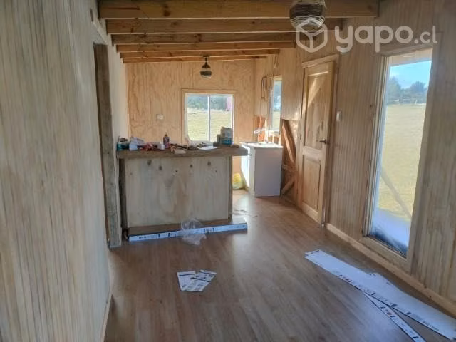 Parcela con casas