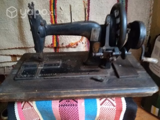 Antigua maquina manual Singer sello Burmeister