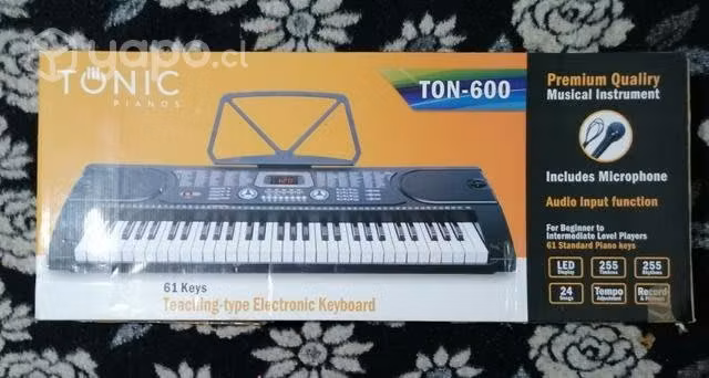 Teclado 61 teclas tonic modelo ton-600, sin uso