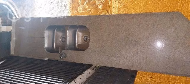 Lavaplatos doble con cubierta de marmol