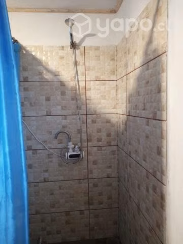 Casa material sólido con sitio
