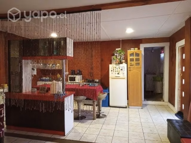 Casa material sólido con sitio