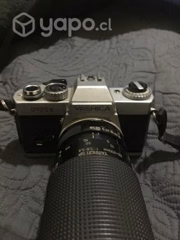 Camara + teleobjetivo