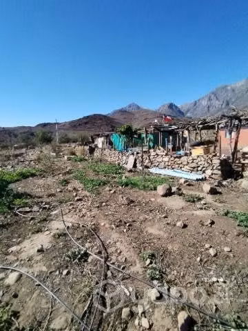 Terreno con casa