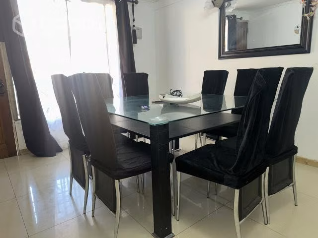 Comedor 8 sillas , mesa de vidrio
