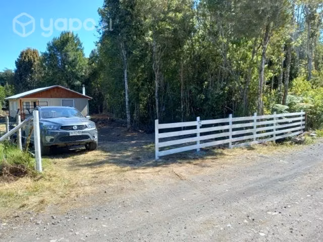 Parcela con casa