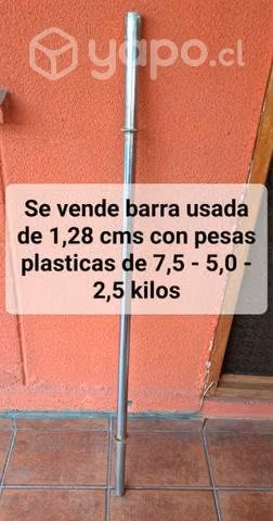 Barra con pesas usada