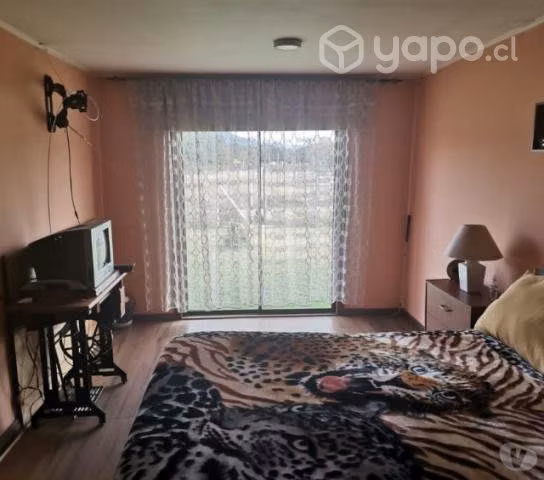 Vendo parcela con casa
