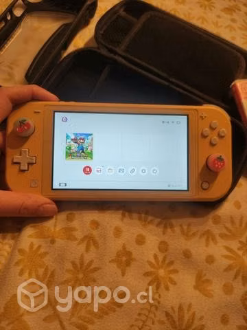 Nintendo Switch Lite con juego y accesorios