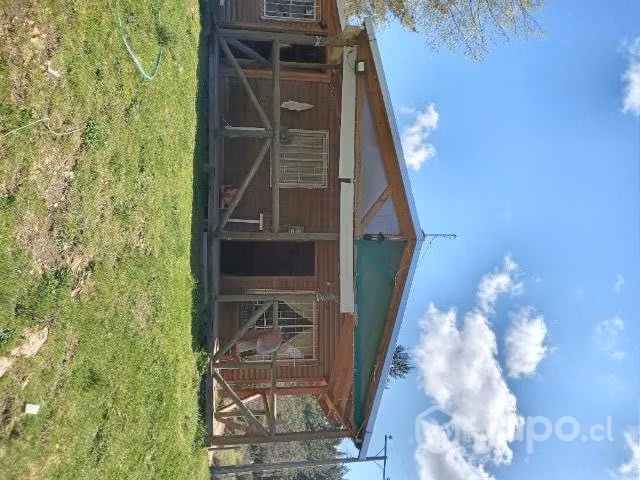 Parcela con casa y piscina