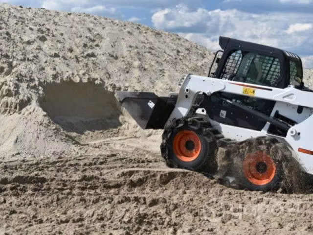 Escombros minicargador camion