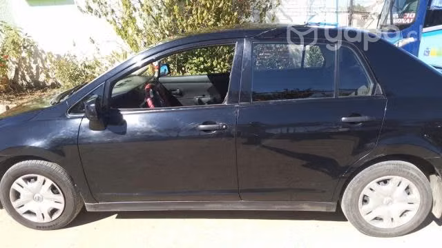 Taxi Colectivo Nissan tiida 2014