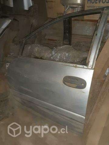Puerta chofer chrysler caravan 97-01 - Imagen 3