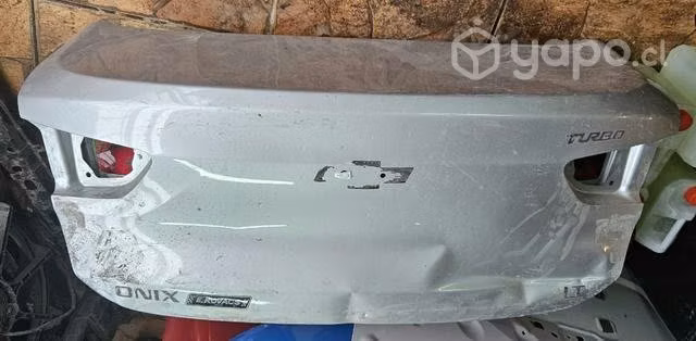 Maleta Onix sedan 2021 2023 detalle leve original