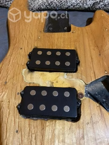 Cuerpo de bajo con cápsulas