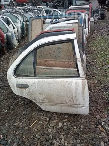 Nissan sentra 2 puerta trasera derecha envio regs