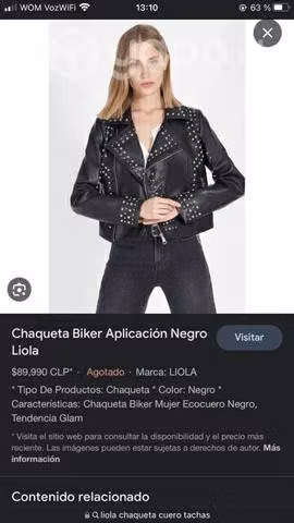 Hermosa Chaqueta biker negra de cuero con tachas
