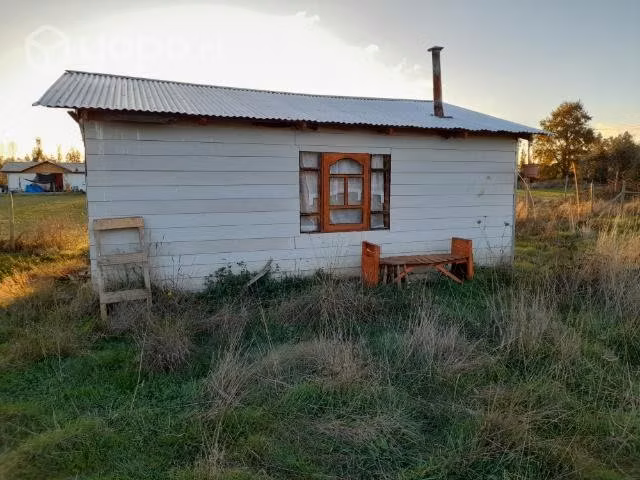 Parcela con casa