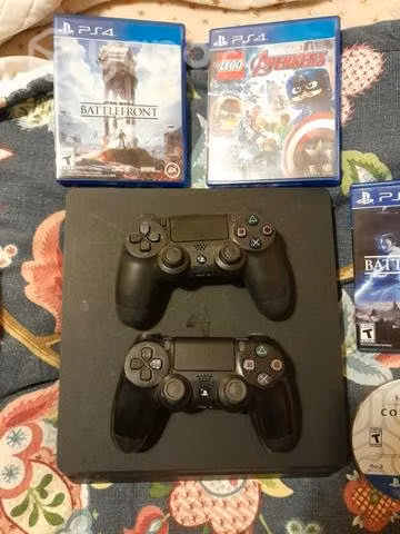 Playstation 4 250gb + 4 jueg + 2 contrles + carga