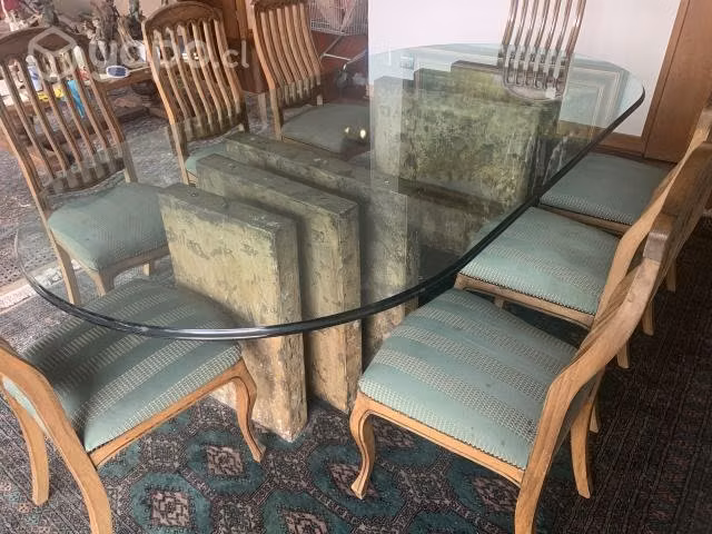 Comedor de vidrio biselado con 8 sillas de madera