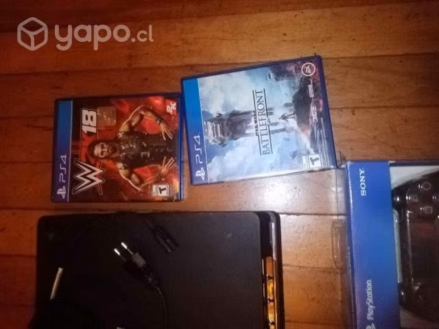 Play station 4 con dos controles y 4 juegos