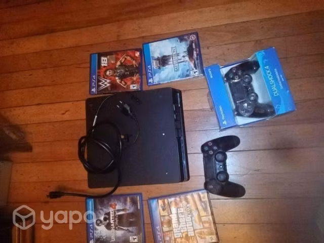 Play station 4 con dos controles y 4 juegos