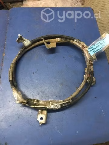 Piola freno mano izquierda Nissan Navara 2008-15