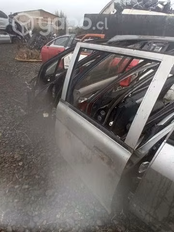 Mitsubishi l200 puerta trasera izquierda env 2005