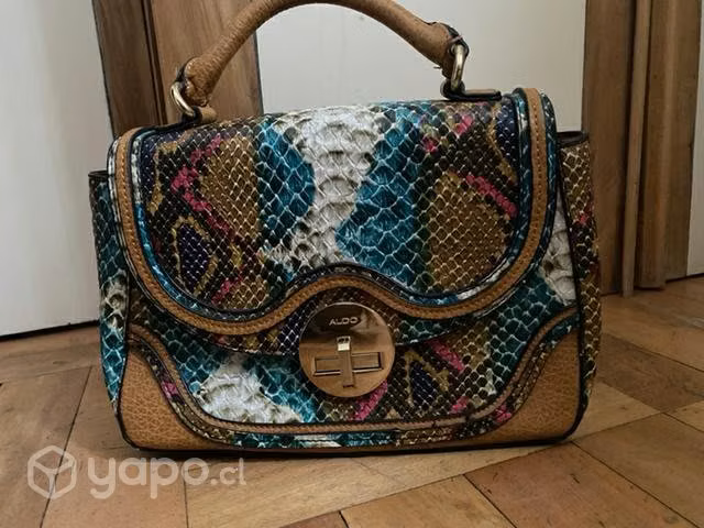 Cartera cuero Aldo animal print multicolor.