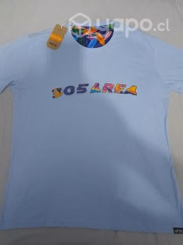Polera celeste marca ICONO