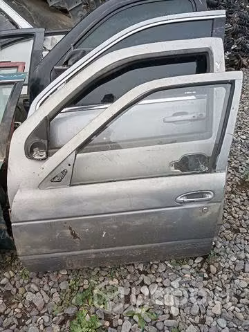 Nissan v16 puerta chofer envio regiones