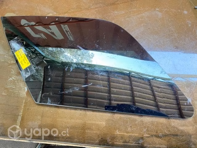 Vidrio original tapabarro tras izq Ford Exp 2014