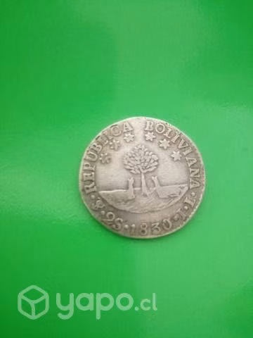 Modeda antigua de plata