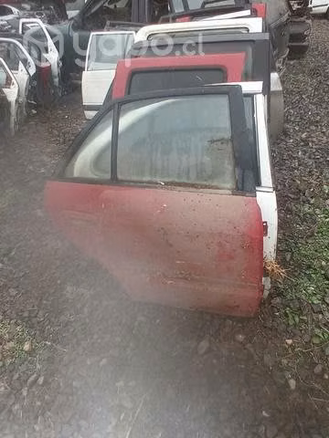Mazda 626 01 puerta trasera derecha manilla chapa