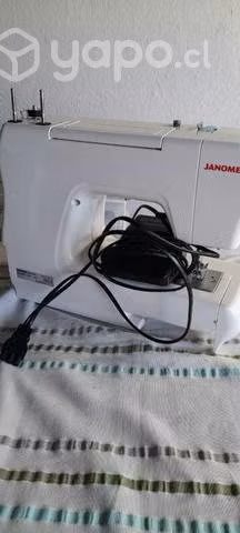 Maquina de cocer casi nueva