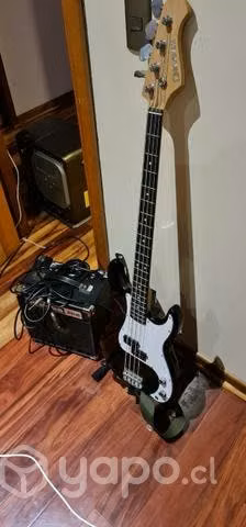 Bajo electrico con amplificador(trae los cables)