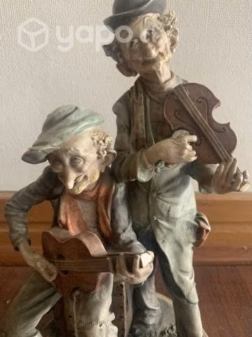 Figura porcelana Guseppe Armani Músicos.