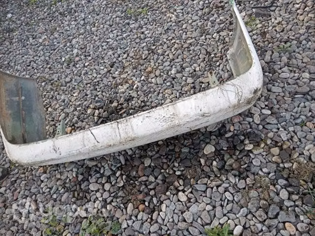 Nissan v16 parachoque trasero