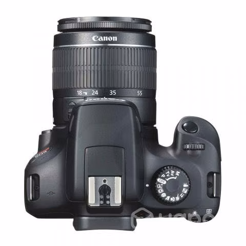 Cámara Reflex Rebel T100 + Lente EF-S 18-55mm